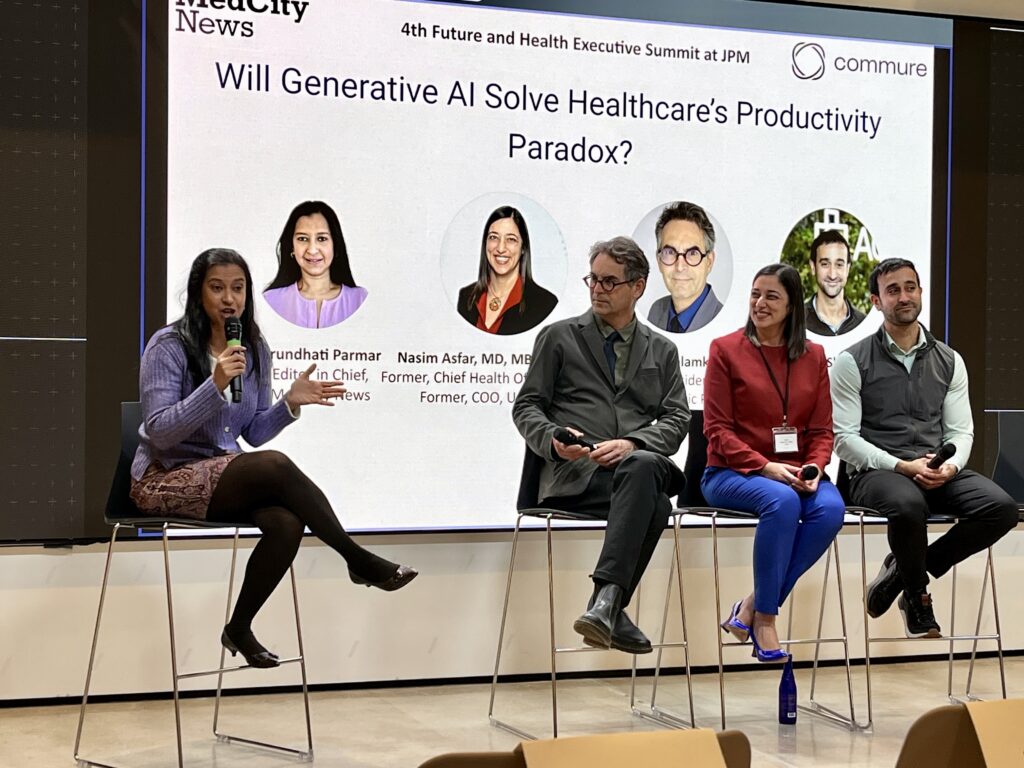 Moderator Arundhati Parmar, Editor in Chief, Med City News. John Halamka, President of Mayo Connect Platform (Mayo Clinic); Nasim Afsar, Former Chief Health Officer, Oracle; Ian Shakil, Chief Strategy Officer, Commure